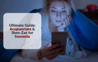 Woman under covers in bed reading phone with superimposed article title "Ultimate Guide: Acupuncture & Shen-Zao for Insomnia"