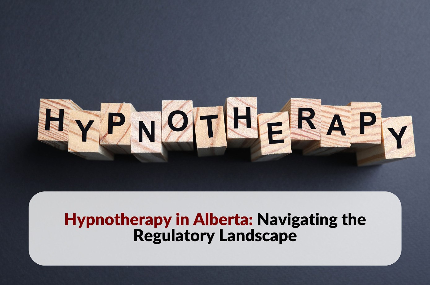 Image depicting the article on hypnotherapy in Alberta, with text superimposed on a blue textured background and wooden blocks spelling 'Hypnotherapy.