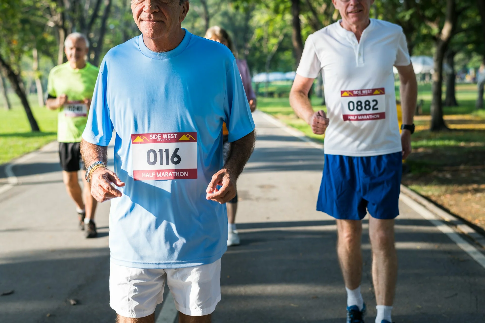 photo - two men running a half marathon with a visible testosterone therapy before and after result