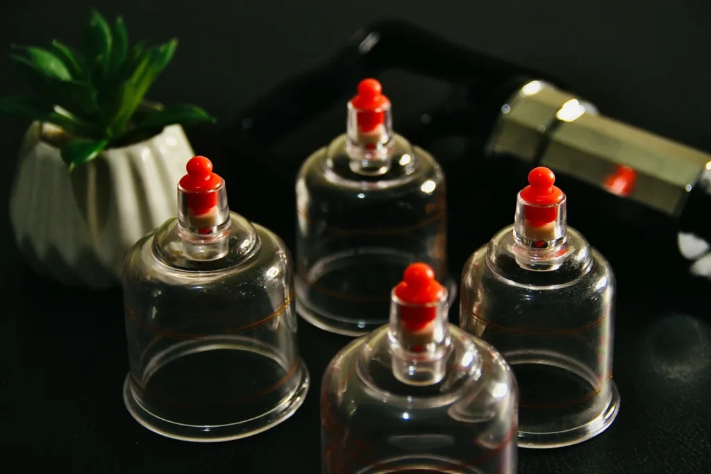 photo - four cups for a cupping therapy. what does cupping therapy do 