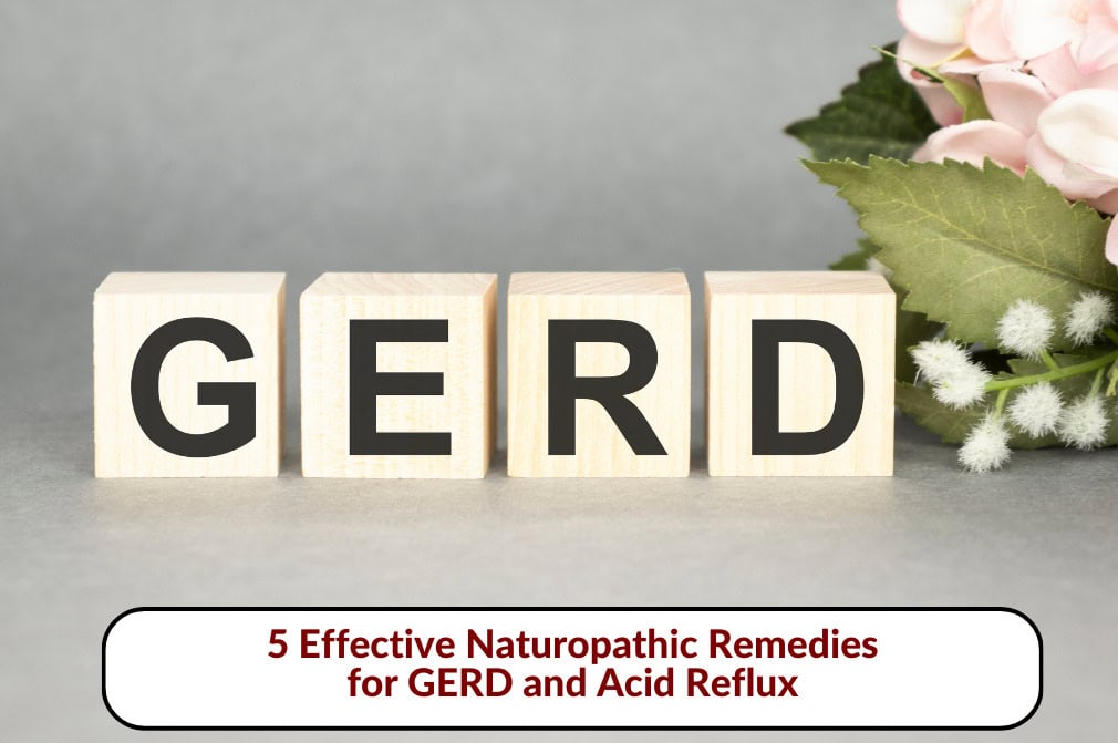 Wooden blocks spelling GERD with a floral background - Red Leaf Wellness Edmonton