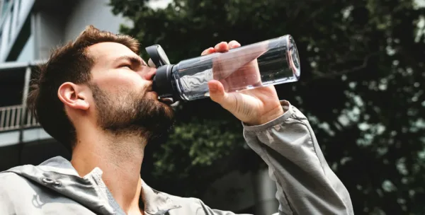 a man drinking water