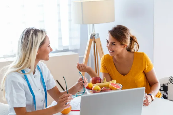 photo - naturopathic doctor vs md talking to a patient