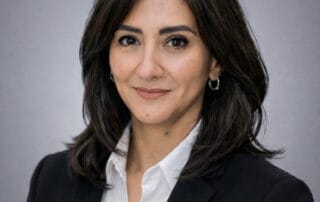 Professional headshot of Dr. Amira Abdelaziz, naturopathic doctor at Red Leaf Wellness Edmonton