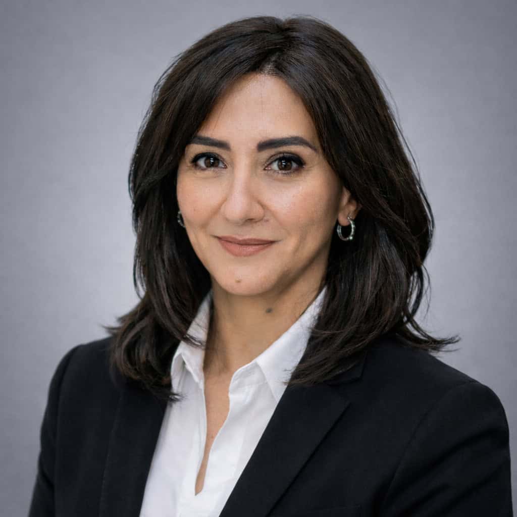 Professional headshot of Dr. Amira Abdelaziz, naturopathic doctor at Red Leaf Wellness Edmonton