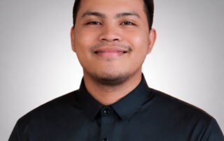 A professional headshot of Francis Gabotero, Virtual Assistant at Red Leaf Wellness Edmonton